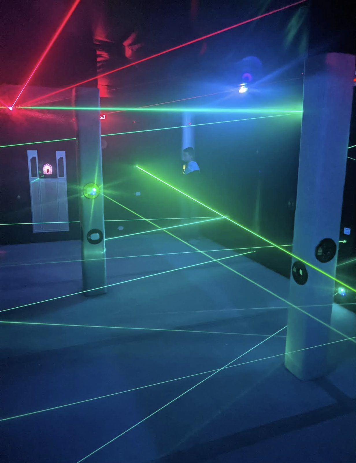 Laser maze with green and red beams at White Mountain Family Fun Park in Lakeside, Arizona