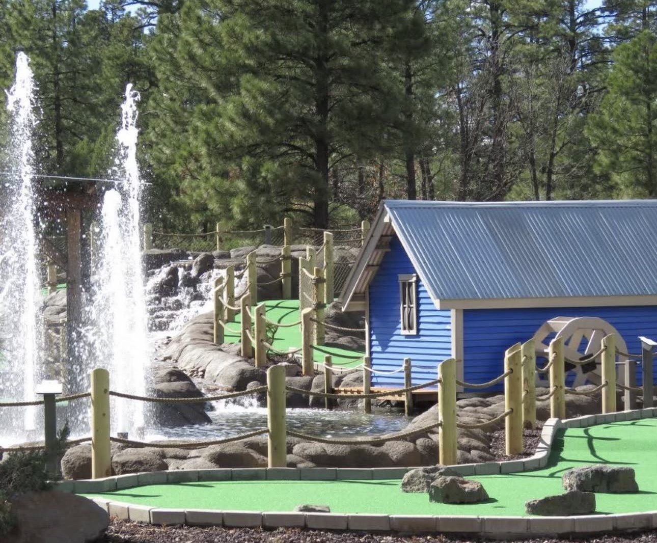 Mini golf course with a water feature at White Mountain Family Fun Park in Lakeside, Arizona