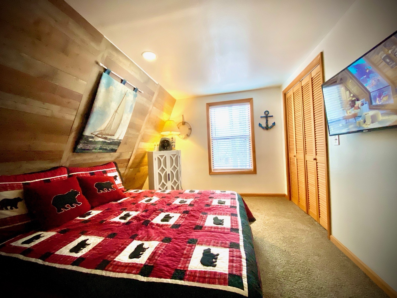 Mohave Cabin bedroom with plaid quilts