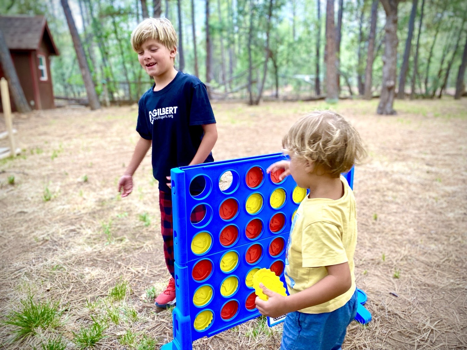 Kids playing yard games at Mohave Cabin
