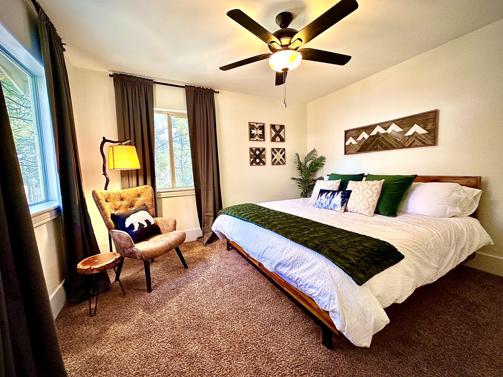 Parkway Lodge king bedroom in green and white
