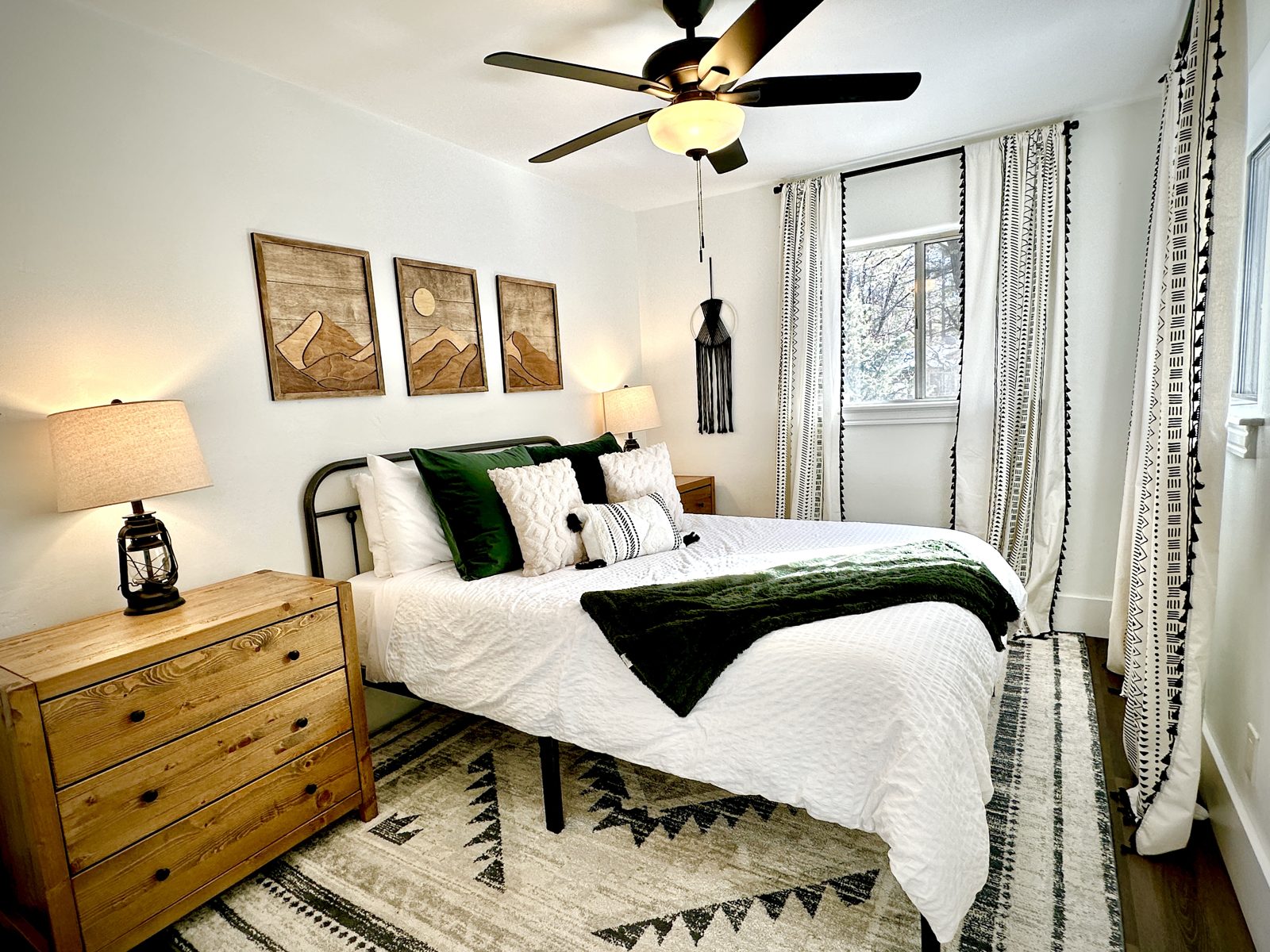 Parkway Lodge queen bedroom with boho decor