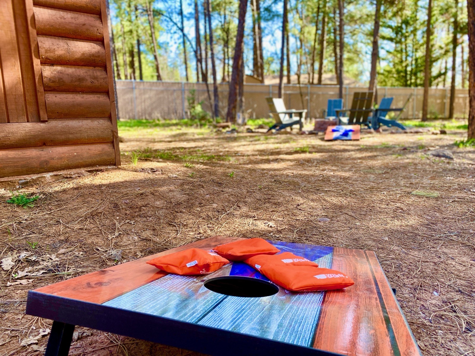 Cornhole boards set up in the yard at Parkway Lodge